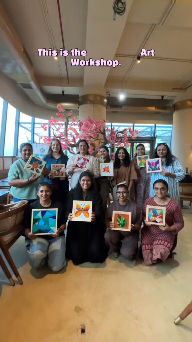 A workshop group showing the colourful Kinusaiga artworks they made together
